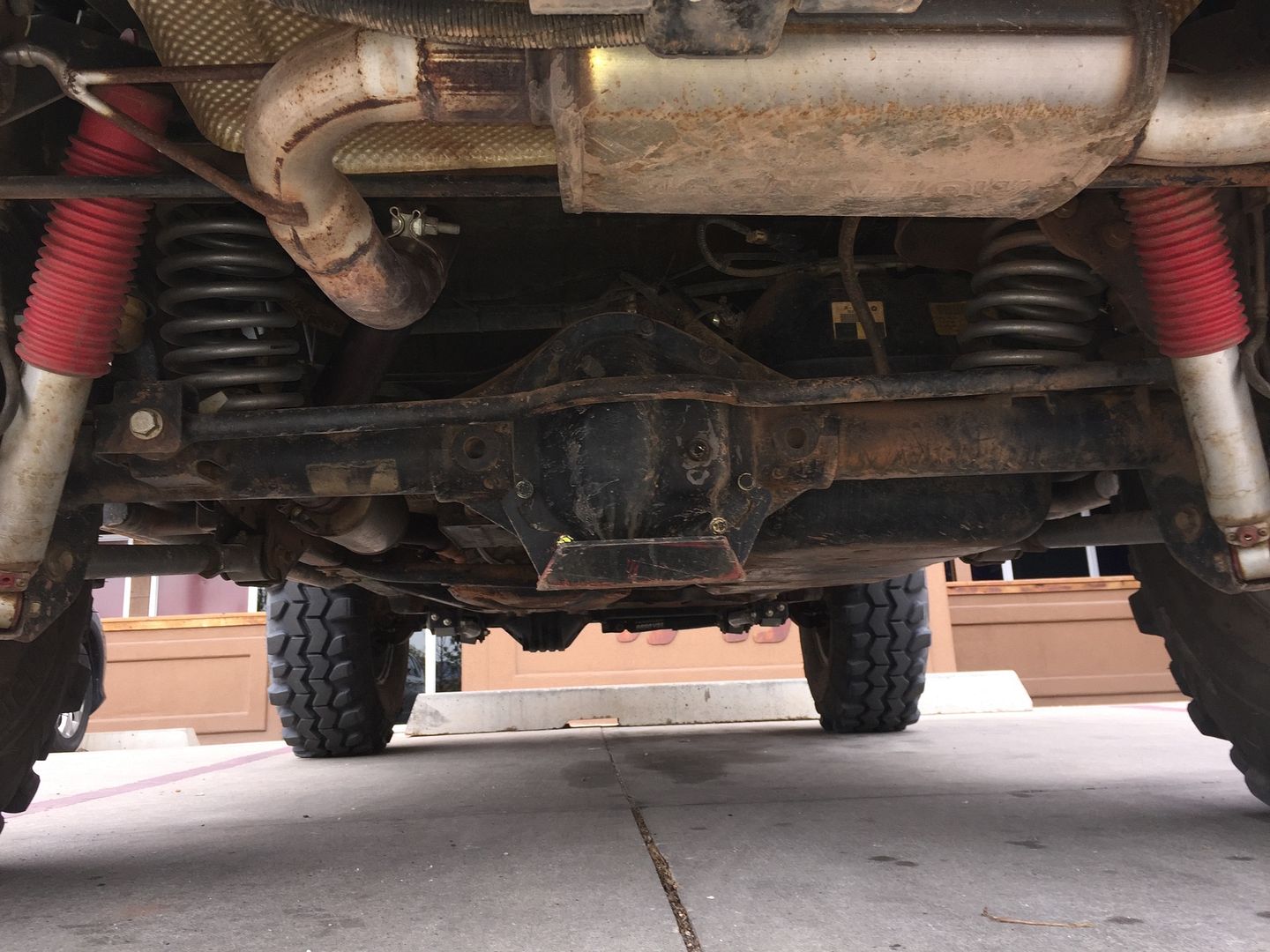 How does rear axle get shifted appx 1.25" to the left? Jeep Wrangler